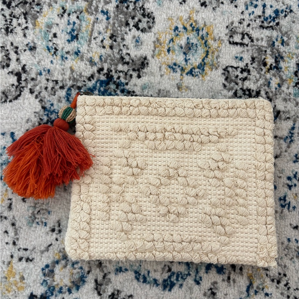 Cream Textured Clutch with Tassel